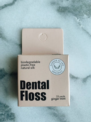 Ginger Mint Biodegradable Zero Waste Silk Floss made from cruelty-free mulberry silk with vegan candelilla wax and peppermint in plastic-free packaging for sustainable oral care.