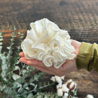 Eco Loco Plastic-Free Shower Puff made from bamboo rayon, soft reusable bath pouf for gentle body cleansing and a plastic-free bathroom routine.